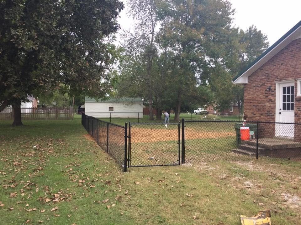 Backyard privacy fence after installation